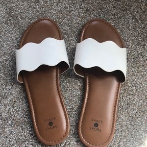 White and tan slip on sandals